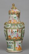 A 19th century Cantonese famille rose lidded vase
Typically decorated with figures in interiors