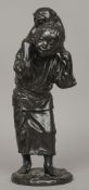 A Japanese Meiji period bronze figure
Modelled as  a boy carrying a dog on his shoulders, two