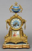 A 19th century gilt metal and Sevres type panel inset mantel clock
The blue enamelled dial with