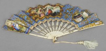 A very fine 19th century French fan
The bone staves with gilt metal mounts inset with a portrait