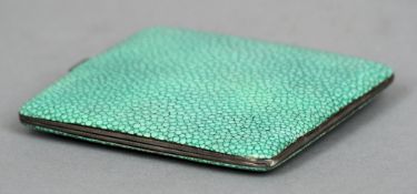 A George V silver and shagreen cigarette case, hallmarked London 1931, maker's mark of V.M.
9 cm