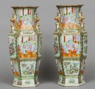 A pair of 19th century Canton famille rose vases
Of hexagonal shape, typically decorated with