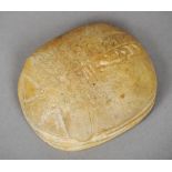 An Egyptian carved stone scarab seal
The matrix worked with four columns of hieroglyphics.  7 cm