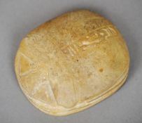 An Egyptian carved stone scarab seal
The matrix worked with four columns of hieroglyphics.  7 cm