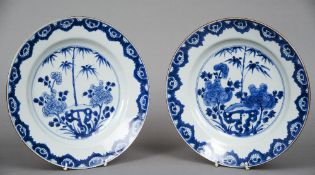 A pair of Chinese porcelain blue and white plates
Centrally decorated with a pierced rock issuing