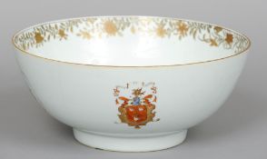 An 18th/19th century Chinese Export armorial porcelain punch bowl
Decorated with floral vignettes