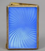A Continental Sterling silver and blue guilloche enamelled cigarette case
The interior gilded.  8.
