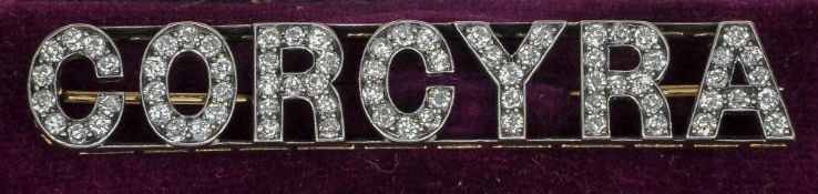 An Edwardian diamond set unmarked white and yellow metal bar brooch
Worked with the name Corcyra, in