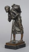 A 19th century bronze figure of a North African water seller
Signed to base and with Braunlish
