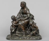 A 19th century bronze group
Modelled as a woman comforting a scantily clad putto, a pilgrim putto