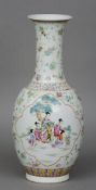 A Chinese porcelain vase
Decorated with figural vignettes interspersed with floral sprays, blue