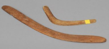 A 19th century Aboriginal carved boomerang 
One side with channelled decoration; together with