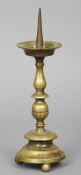 A 19th century bronze pricket stick
Of typical form, standing on ball feet.  36.5 cm high. CONDITION