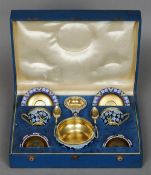 A Russian silver gilt and champleve enamel tea set, with 916 Zolotnik Post 1958 Kokoshnik mark and