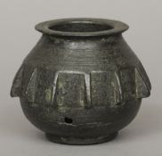 A 16th century or earlier European bronze mortar 
Cast with four flanges; together with another of