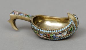 A Russian silver and champleve enamel kovsh, marks indistinct
Of typical form.  8.5 cm long.