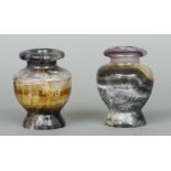 A pair of fluorite baluster vases
13 cm high.  (2) CONDITION REPORTS: Both generally in good