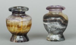 A pair of fluorite baluster vases
13 cm high.  (2) CONDITION REPORTS: Both generally in good