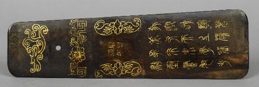 A Chinese bronzed spatula
Gilt decorated with figures, bats and archaic calligraphic script and four