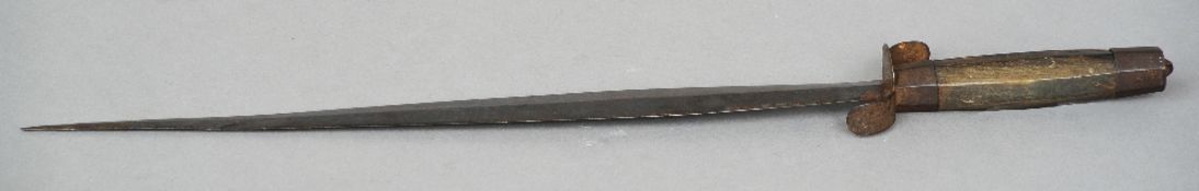 A 19th century Visayan short sword 
With double edged spear point blade and octagonal section