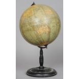 A Phillips 12 inch terrestrial globe
On ebonised stand.  53 cm high. CONDITION REPORTS: Generally in