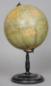 A Phillips 12 inch terrestrial globe
On ebonised stand.  53 cm high. CONDITION REPORTS: Generally in