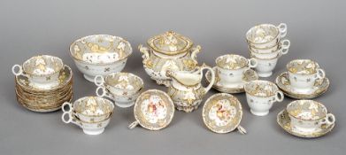 A Victorian porcelain tea service, possibly Rockingham
Painted with fruiting foliage and with gilt