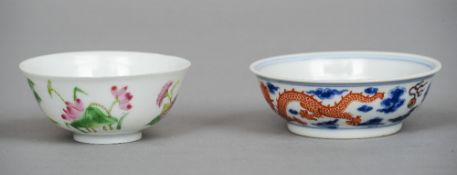 A Chinese porcelain tea bowl
With floral decoration; together with a Chinese porcelain saucer,