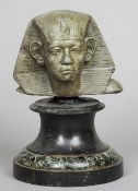 After the Antique
Egyptian bust
Mounted on a matt slate and marble plinth base
21 cm high