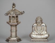 An early 20th century Chinese silver pepperette formed as Buddha
Typically modelled seated; together