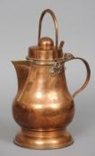 A 19th century copper water jug
Of baluster form, with carrying handle, hinged cover, loop handle