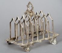 A William IV silver seven bar toast rack, hallmarked London 1835, maker's mark of Charles Thomas Fox