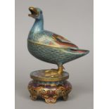 A late 19th century Chinese cloisonne censer
Modelled as a duck, standing on a pierced base.  23.5