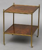 An early 20th century brass framed mahogany two tier etagere
Of square form with tubular uprights