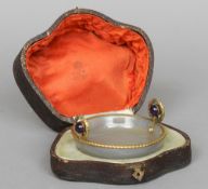 A Russian gold mounted diamond and semi-precious stone set twin handled carved onyx caviar dish,
