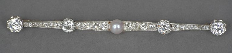 A large mid 20th century white gold or platinum pearl set diamond bar brooch
Centred with a pearl