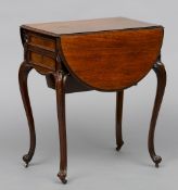 A 19th century rosewood Pembroke work table 
The rounded twin flap top above a frieze drawer and