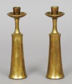 JENS QUISTGAARD (1919-2008) Danish, for Dansk Designs
A pair of brass candlesticks
Impressed marks.