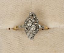 An unmarked gold diamond set ring
Of pierced shaped lobed form.   CONDITION REPORTS: Overall good,