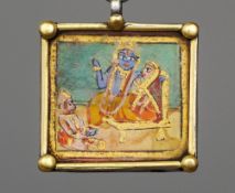 An Indian Mughal unmarked silver pendant
Of square form centred with a gilt heightened miniature