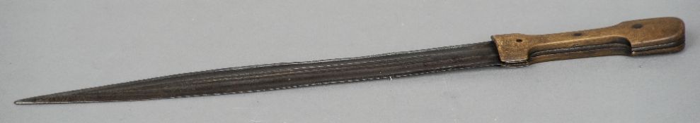 A Caucasian Kinjal knife
With typically decorated grooved double edge blade.  43 cm long.