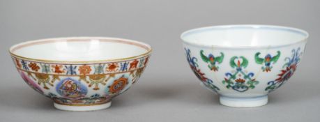 A Chinese porcelain bowl
Decorated with lotus strapwork, blue painted six character Yongzheng mark