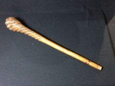 A spiral carved wood tribal club
75 cm long. CONDITION REPORTS: Generally in good condition,