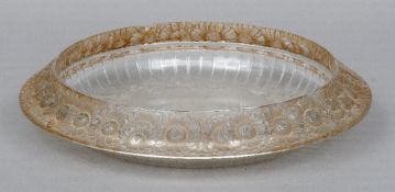 A Rene Lalique moulded glass dish
Marguerite Daisy pattern, stencilled mark R. Lalique, France.
