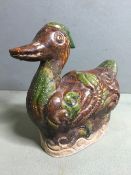 A Chinese pottery model of a duck
Naturalistically modelled with mottled glaze.  14 cm high.