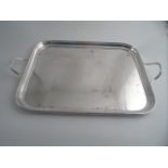 A LARGE SILVERPLATED RECTANGULAR TRAY with reeded rim and handles. James Dixon & Son, Sheffield.