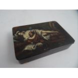 A STOBWASSER PAPIER MÂCHÉ SNUFF BOX. The hinged lid portraying a young couple being spied upon by