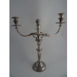 A SHEFFIELD PLATED TWO BRANCH THREE SCONCE TABLE CANDELABRA. Chased with leaves on turned tapered