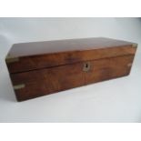 AN EARLY 19THC MAHOGANY WRITING BOX. Gilt tooled leather writing slope fitted with pen, ink and