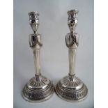 A PAIR OF SILVER TYPE METAL NEOCLASSICAL DESIGN TABLE CANDLESTICKS (similar to Matthew Boulton